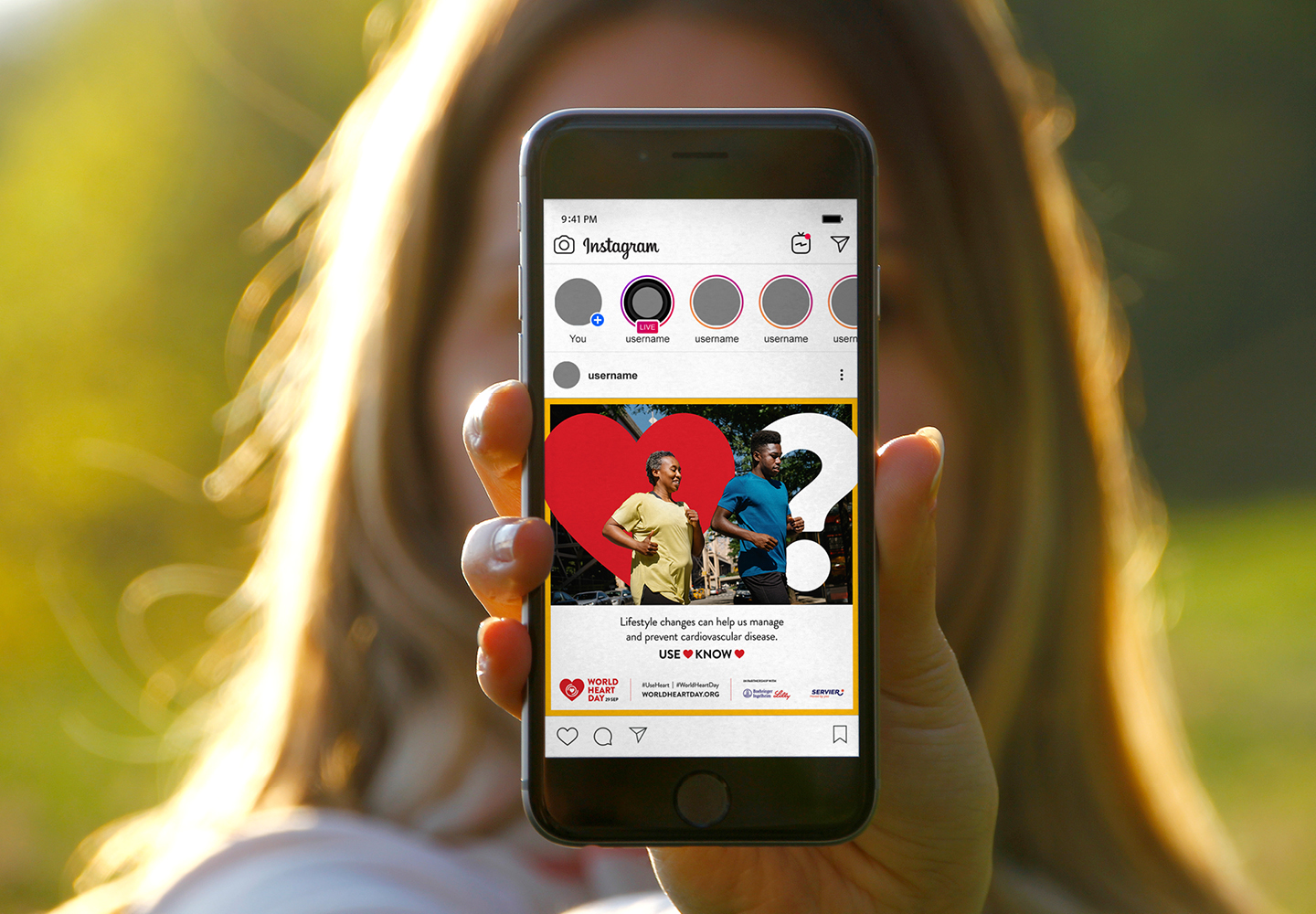 Apple iPhone showing a World Heart Day 2023 campaign banner