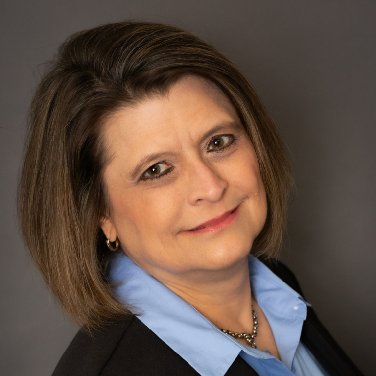 A portrait image of Andrea Baer