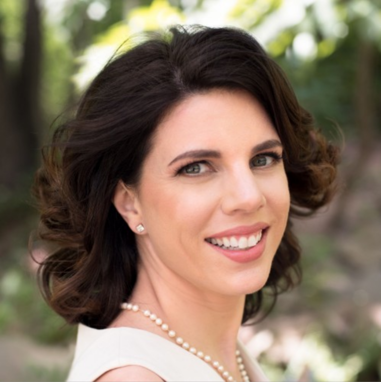 A portrait image of Andrea Feigl
