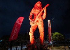 Bob Marley statue, illuminated red for World Heart Day