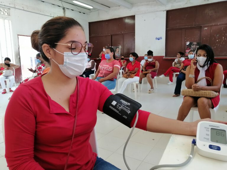 International women's day 2022, women being examined for cardiovascular disease