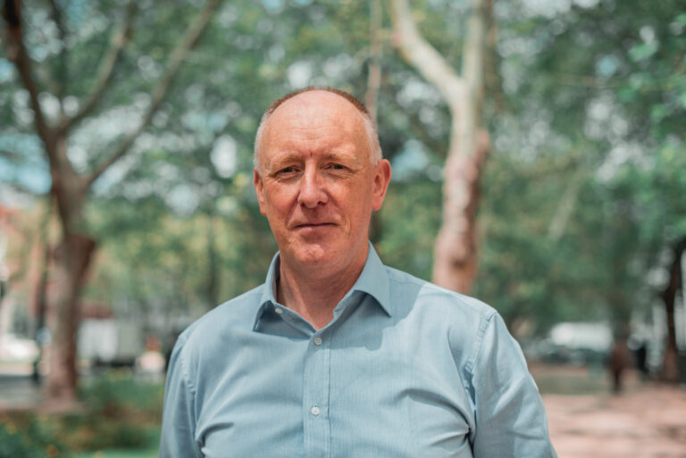 A portrait image of Neil Johnson