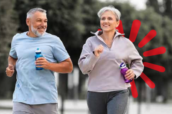 A woman and man running down a road holding water bottles - World Adherence Day 2026