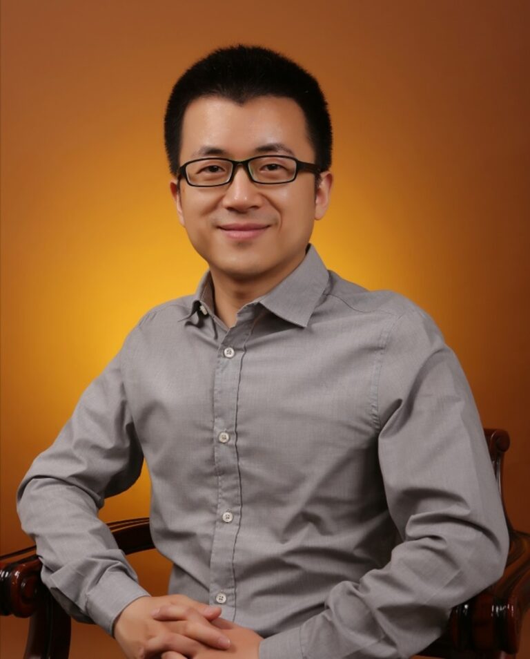 A portrait image of Peng Yin at the World Heart Federation's World Heart Summit 2022