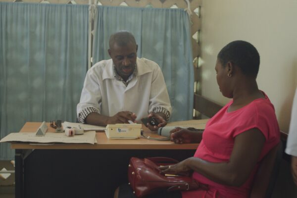 An image of a doctor and a patient