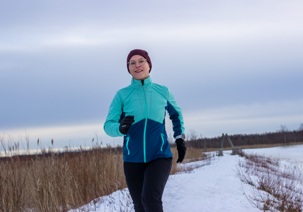 Dr Riikka Ahola going for a run in the blistering cold on a bed of fallen snow
