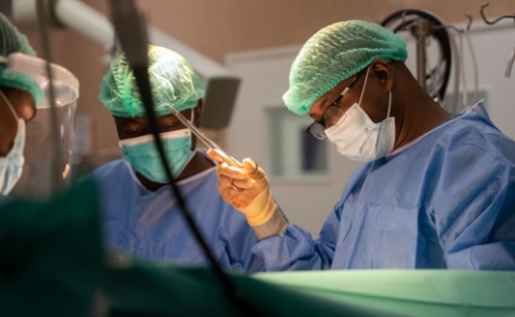Medical professionals operating on a patient- science & public health
