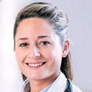 portrait image of a Lucrecia Burgos smiling