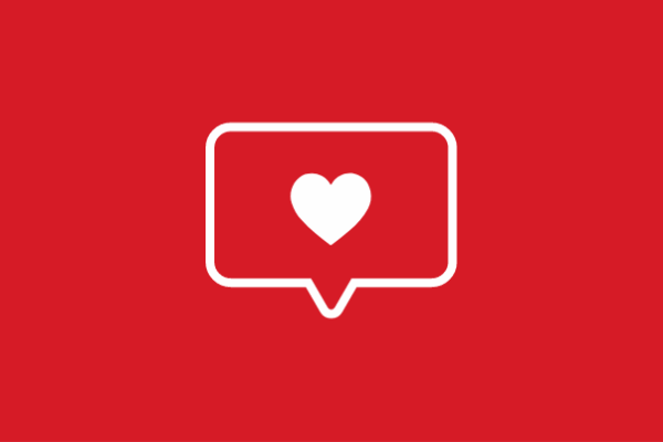 White icon on red background - speech social with heart in middle