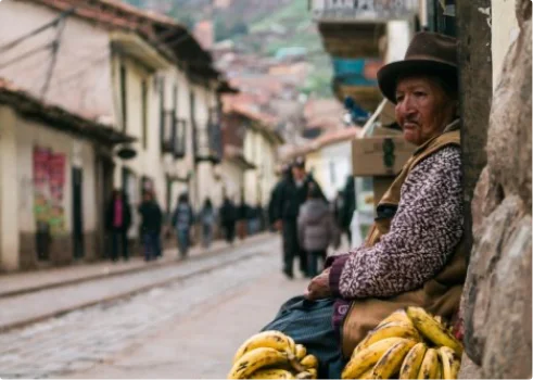Bolivia Woman sat on street