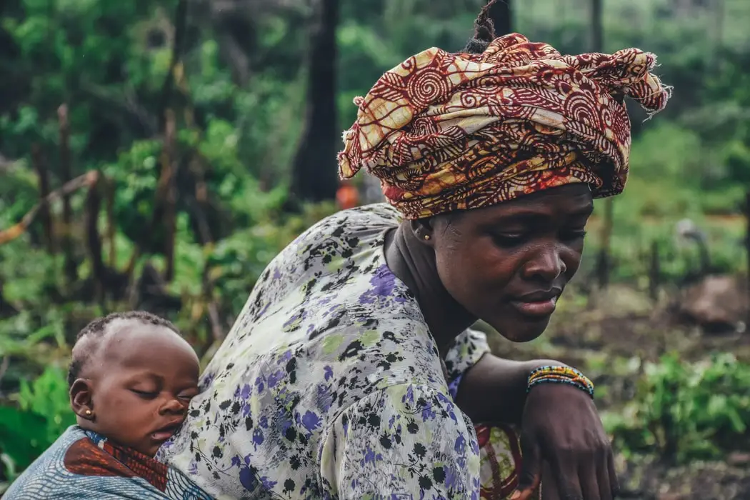 African woman with a baby on her back