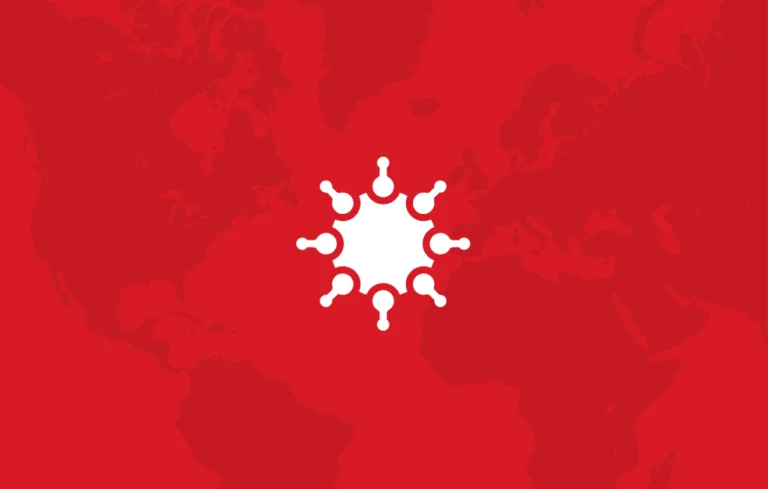 COVID-19 icon on top of a background showing countries around the world with a red overlay