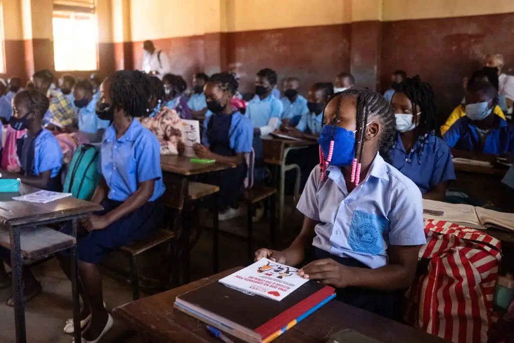 a classroom full of children learning about colours to save hearts