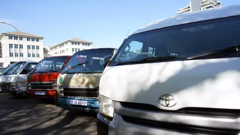 Beats Of Change - A line of old battered trucks and vans - Toyota
