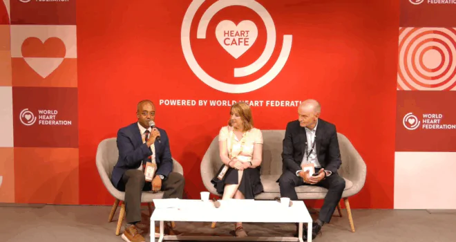 Heart Cafe Launch or Roadmap - WHF, peeople sat on sofa and chairs around a white table giving a presentation to others