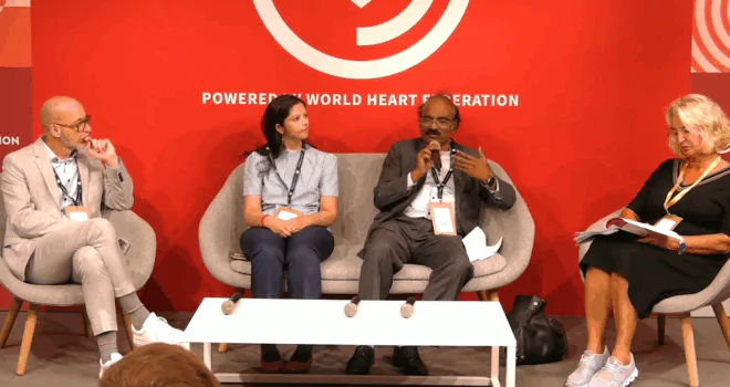 Heart Cafe Launch or Roadmap - WHF, peeople sat on sofa and chairs around a white table giving a presentation to others