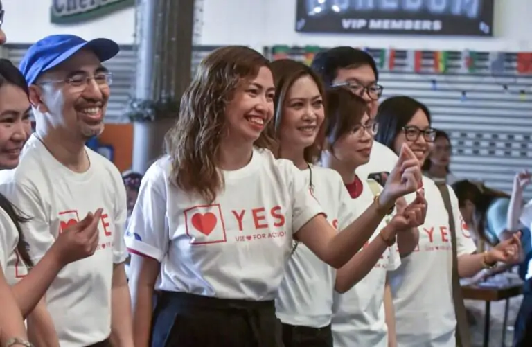 A group of people wearing world heart day tshirts with the 2024 slogan Say Yes for the petition
