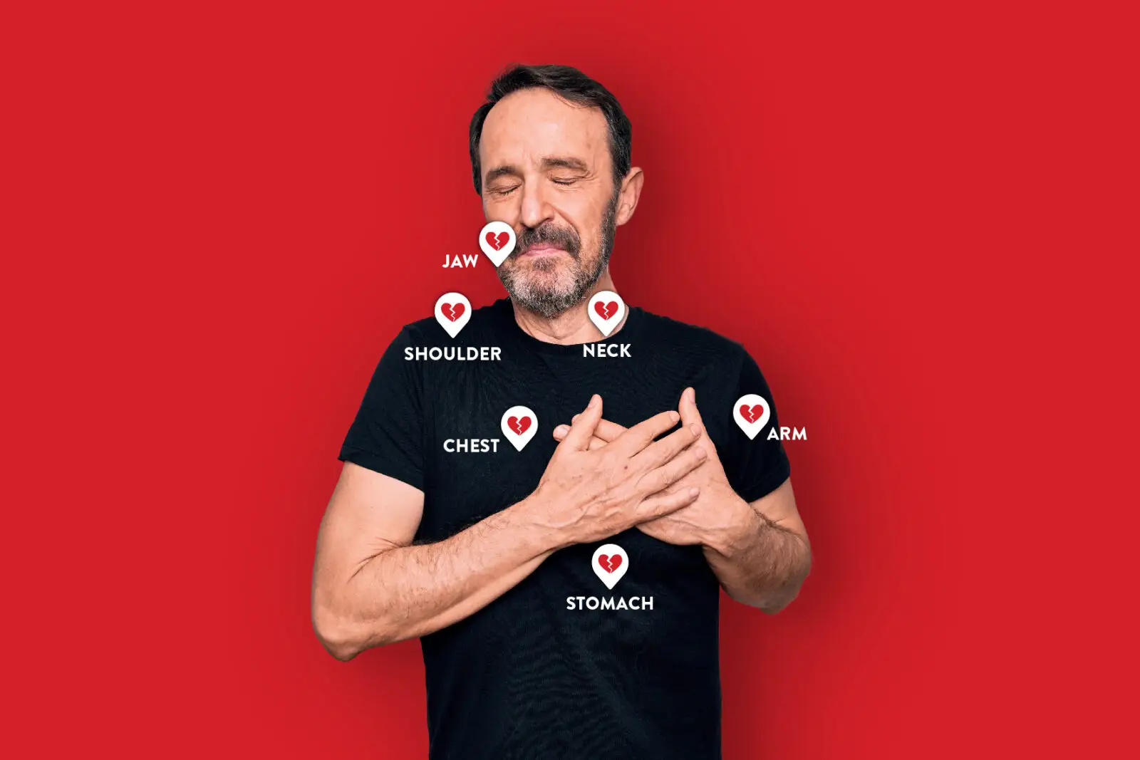 A man holding his heart wearing a black t-shirt and with a red background