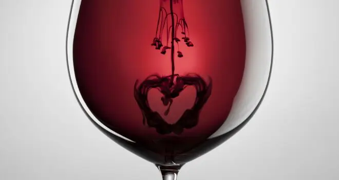 Wine glass, red wine, black ink and heart. Abstract love art