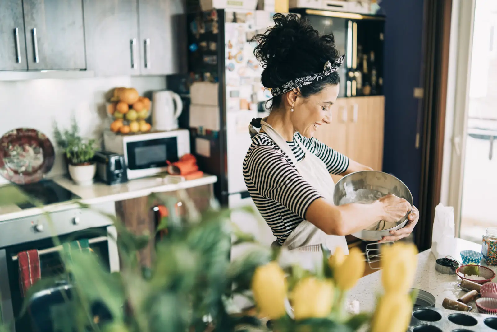 A woman baking in the kitchen